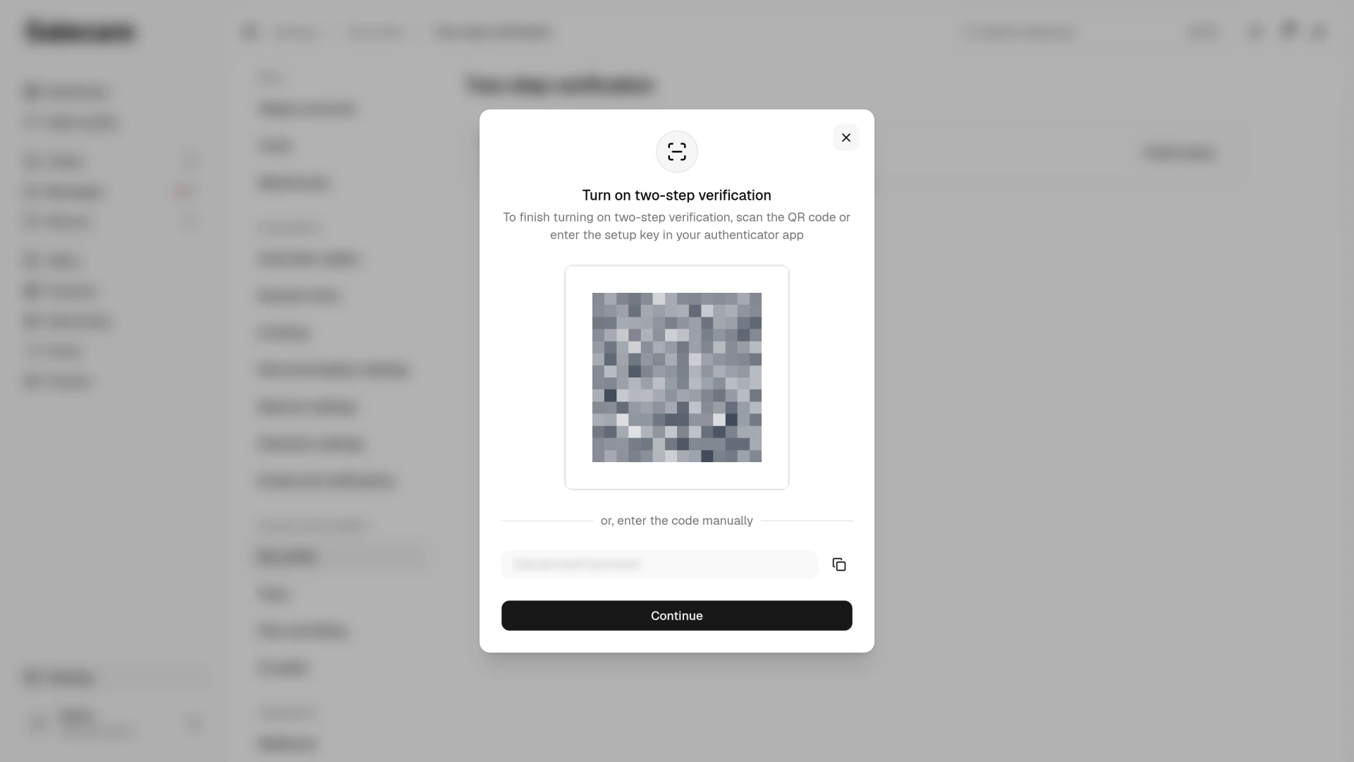 The dialog with the QR code to scan and the key to enter manually